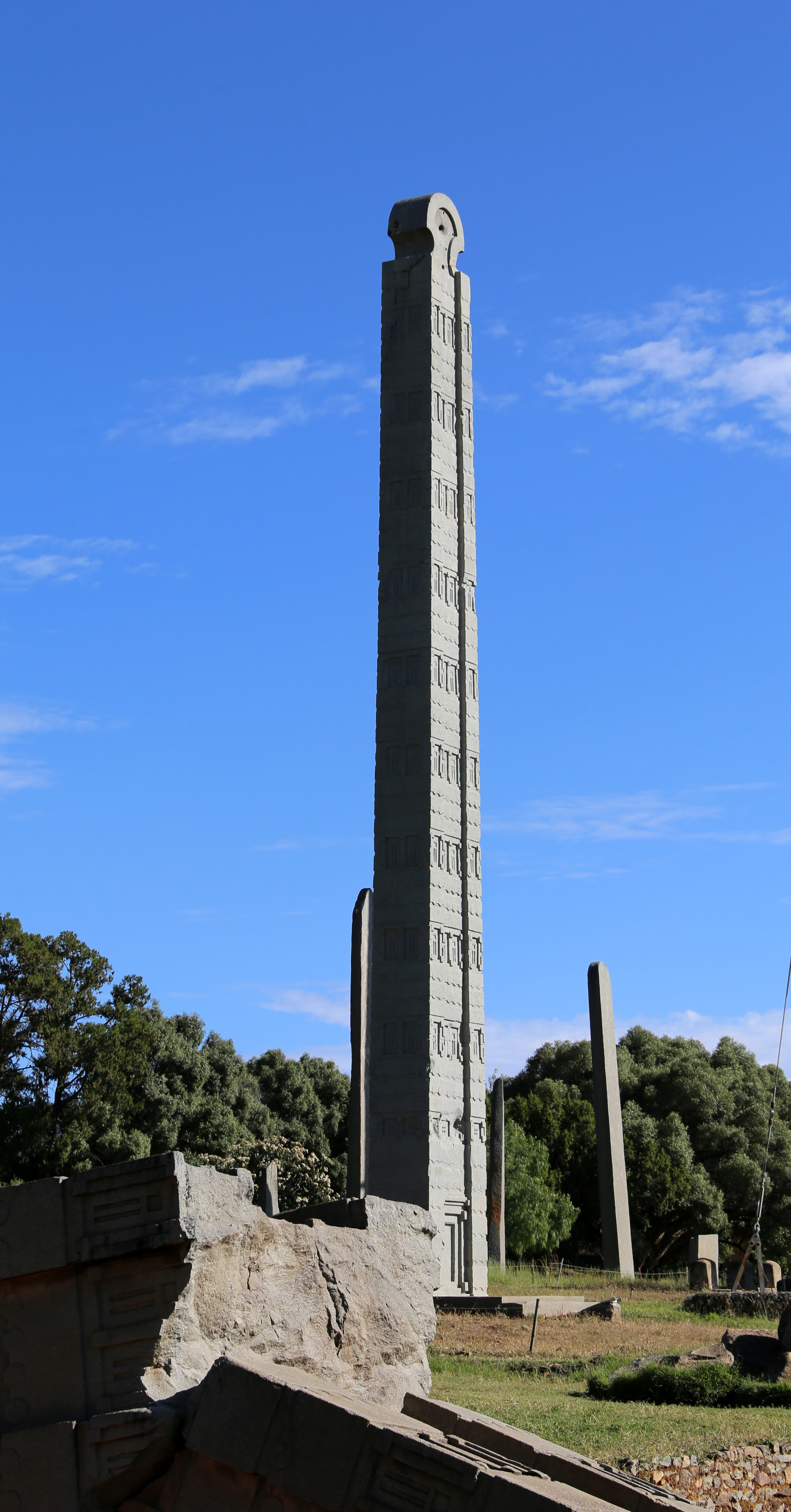 The Obelisk of Aksum, a carved granite stele standing against a blue sky
