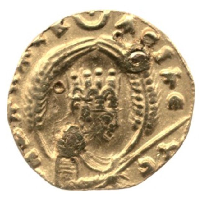 A small gold coin showing a crowned king's bust in profile with a crescent and disc symbol above